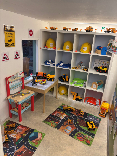 Room filled with construction toys