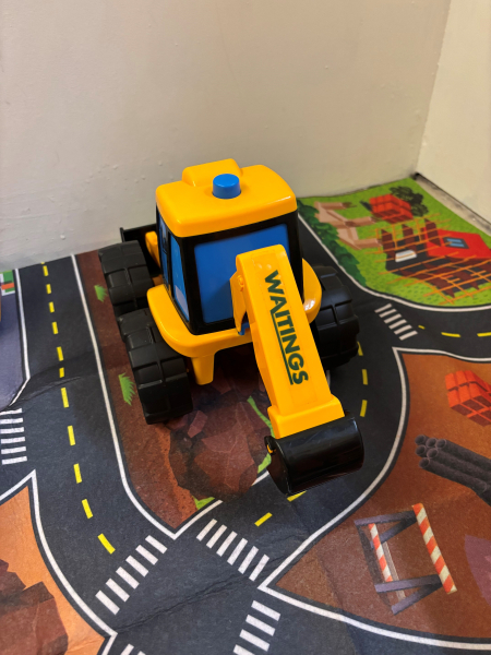 Mini toy digger in yellow